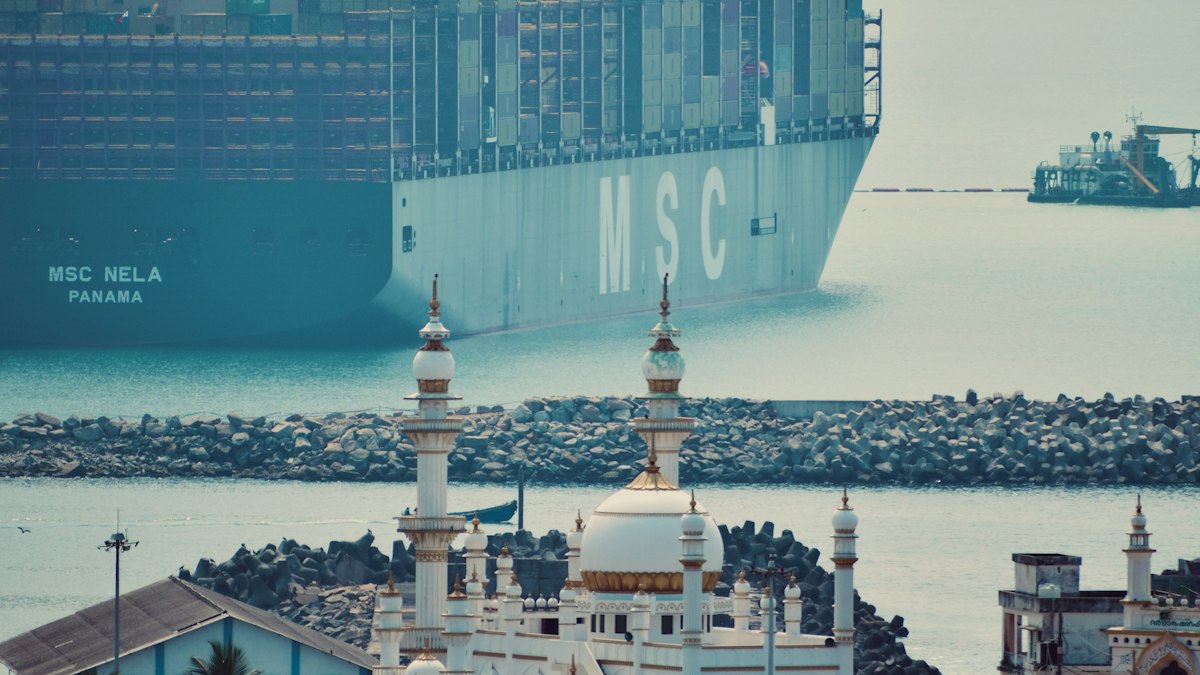 A large cargo ship anchored off a coastal town in India | Diwali 2026