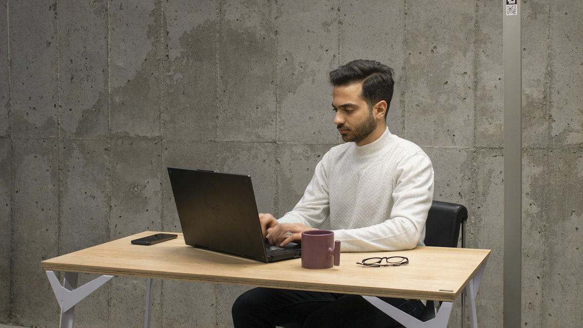 A man working on a laptop at a table, the way most cross-border digital sales into India start | Diwali 2026