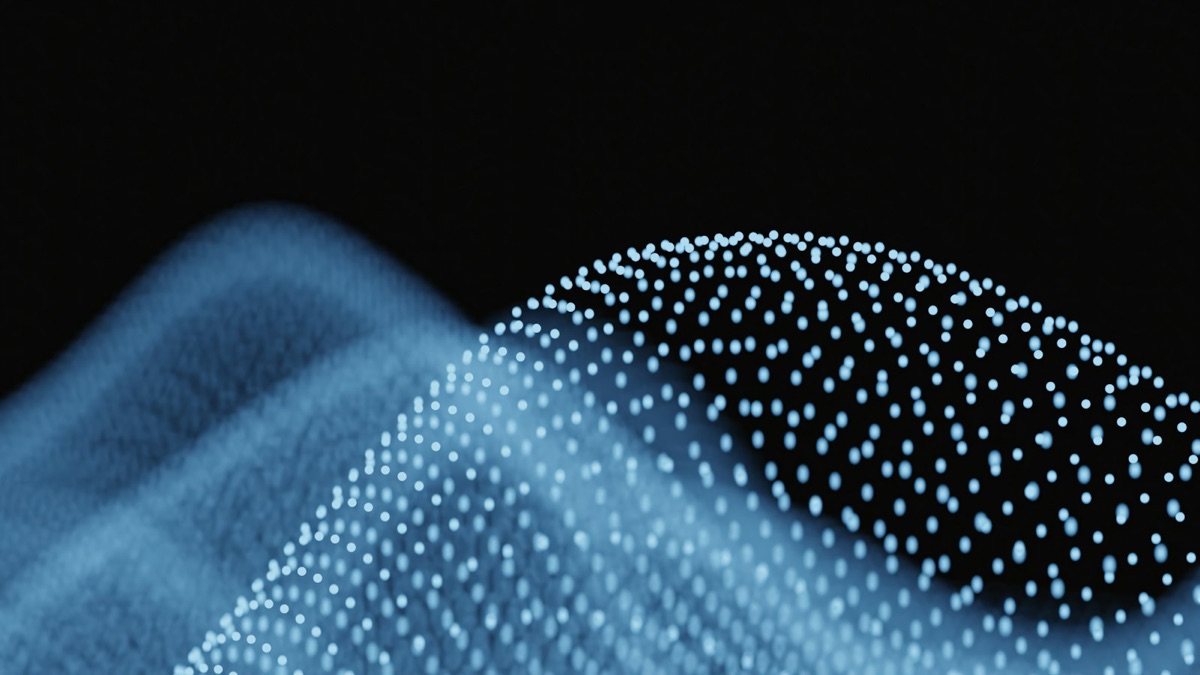 Waves of glowing particles on a dark background